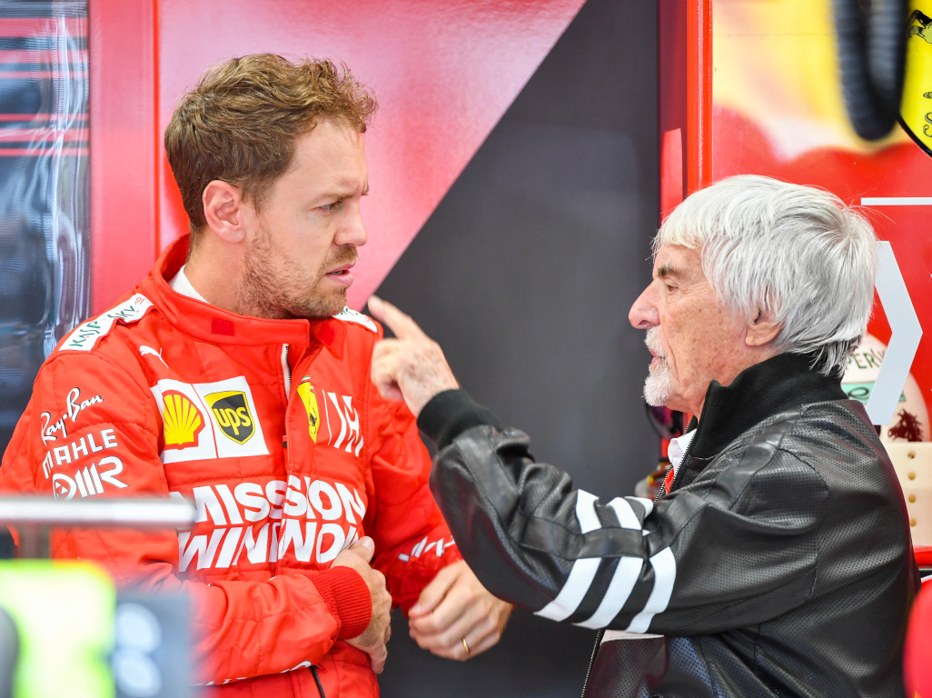 Vettel talking with Bernie in the garrage
