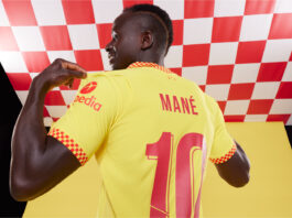Mane poses with new kit
